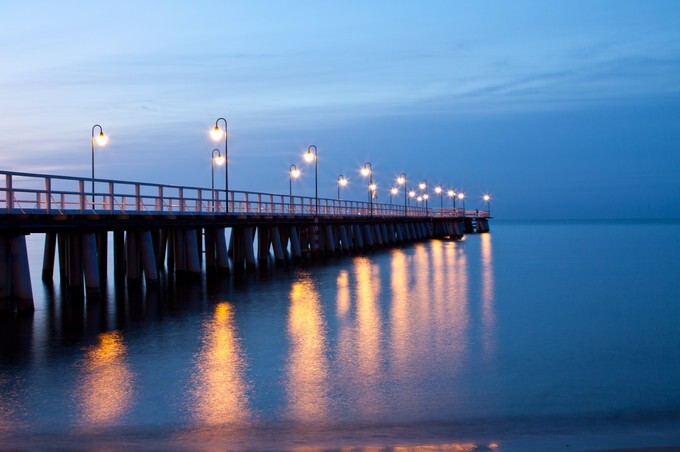 Sunrise on the pier at the seaside, Gdynia Orlowo, Poland